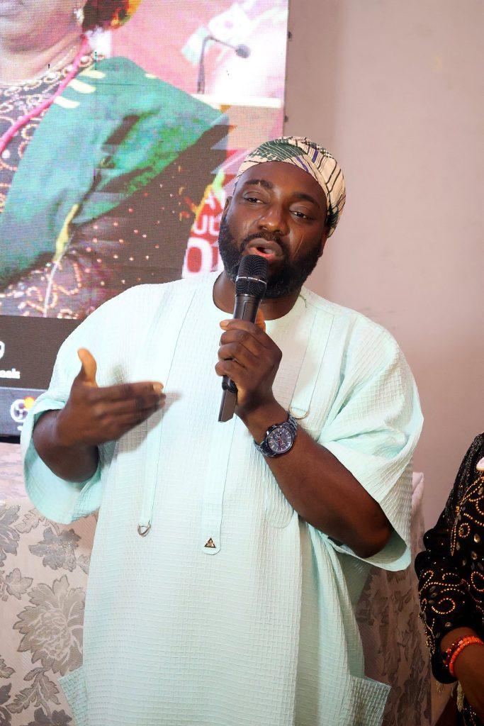 A speaker in a mint agbada addresses the hall at the 4th Annual Yorùbá Global Conference