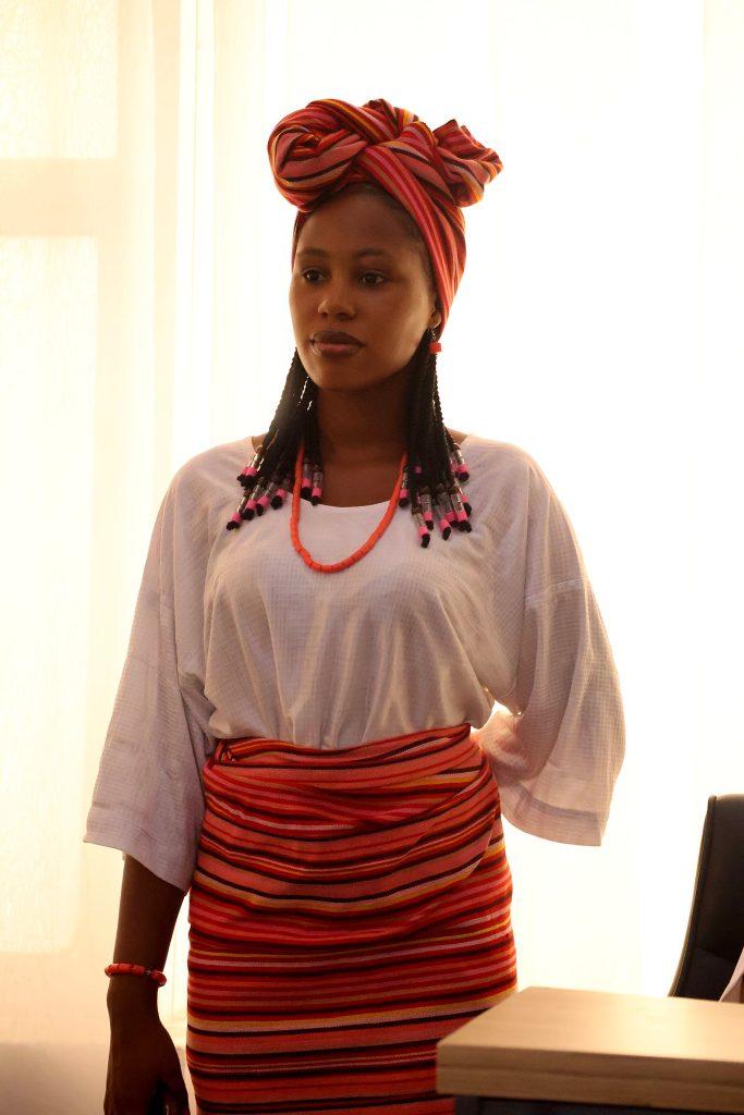 A young woman in traditional Yorùbá attire and coral beads at the 4th Annual Yorùbá Global Conference
