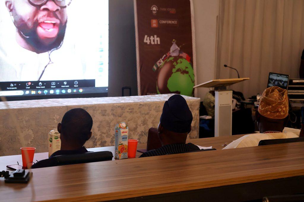 A speaker joins by video link at the 4th Annual Yorùbá Global Conference