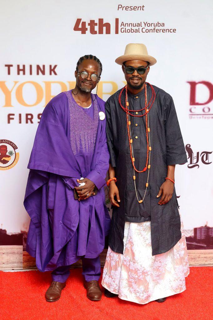 Two guests in agbada on the red carpet at the 4th Annual Yorùbá Global Conference